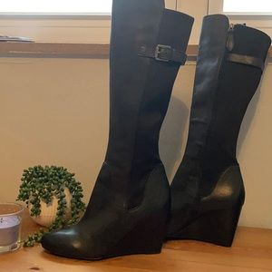 Knee high wedge boots